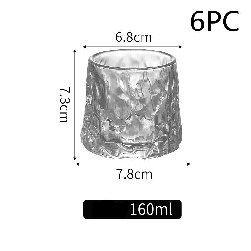 Thickened rotating tumbler whiskey glass