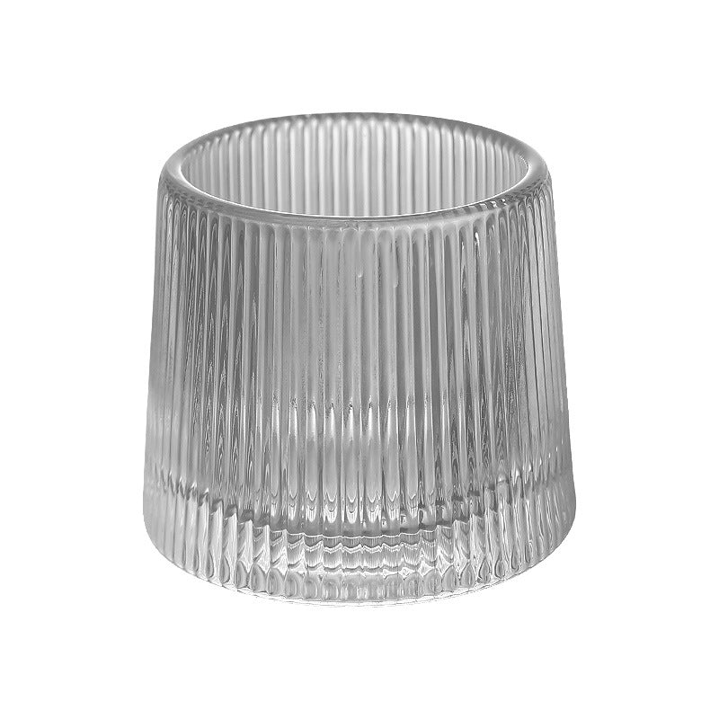 Thickened rotating tumbler whiskey glass